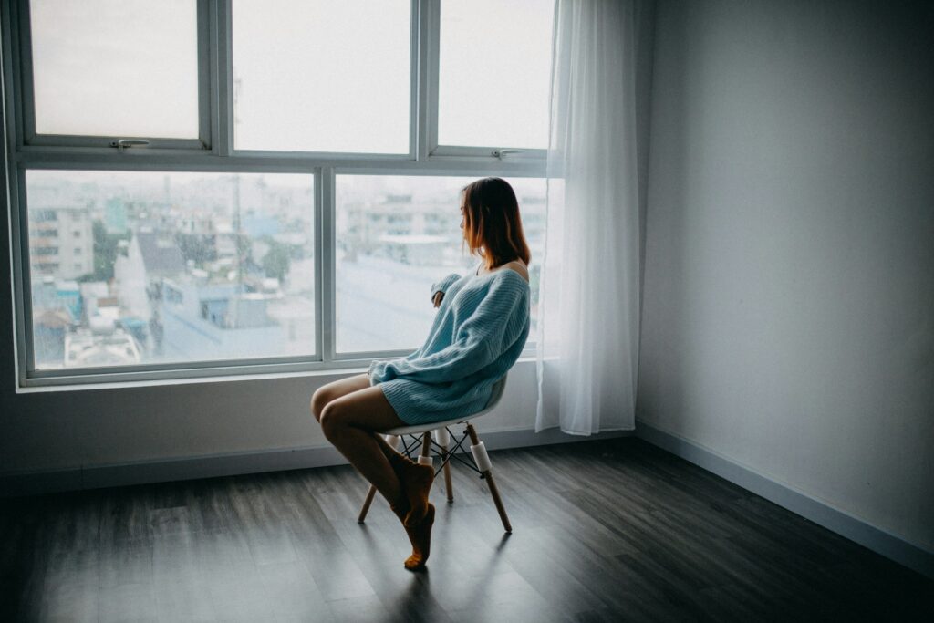 woman sitting alone