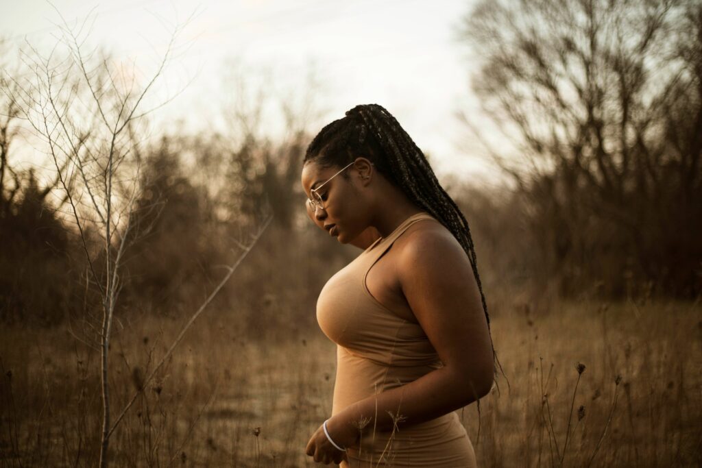 anxious woman outside in field