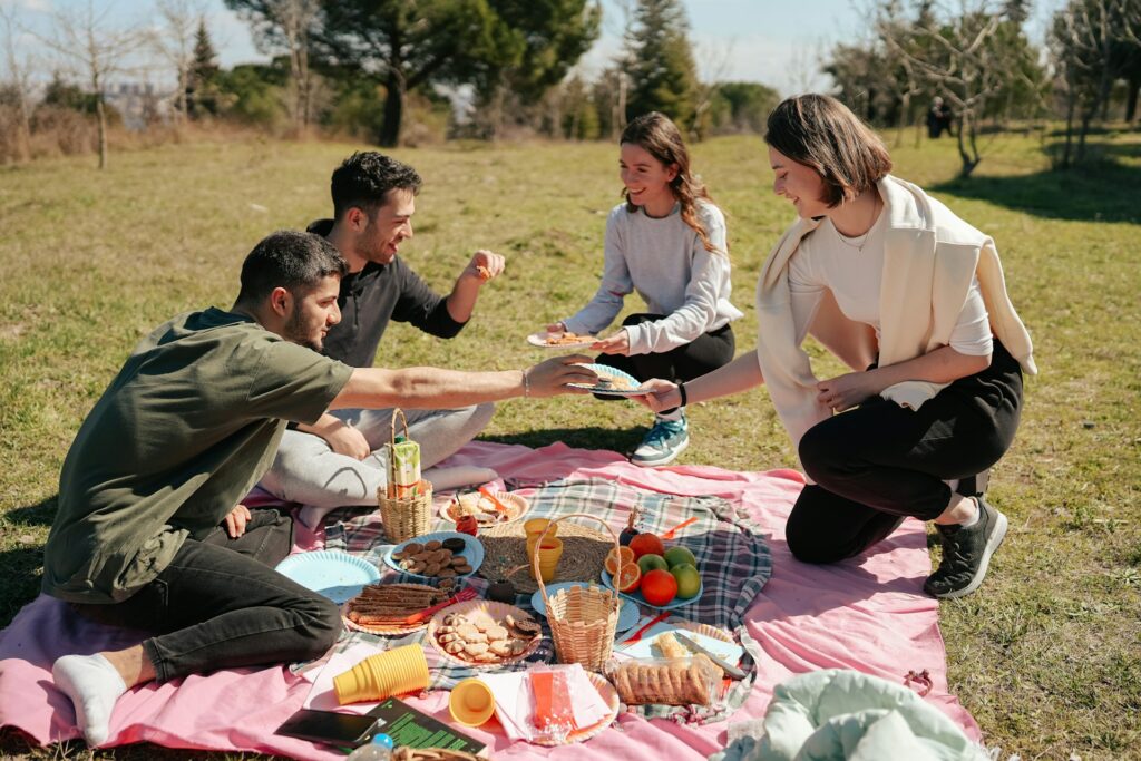 friends having a picnic on sunny day